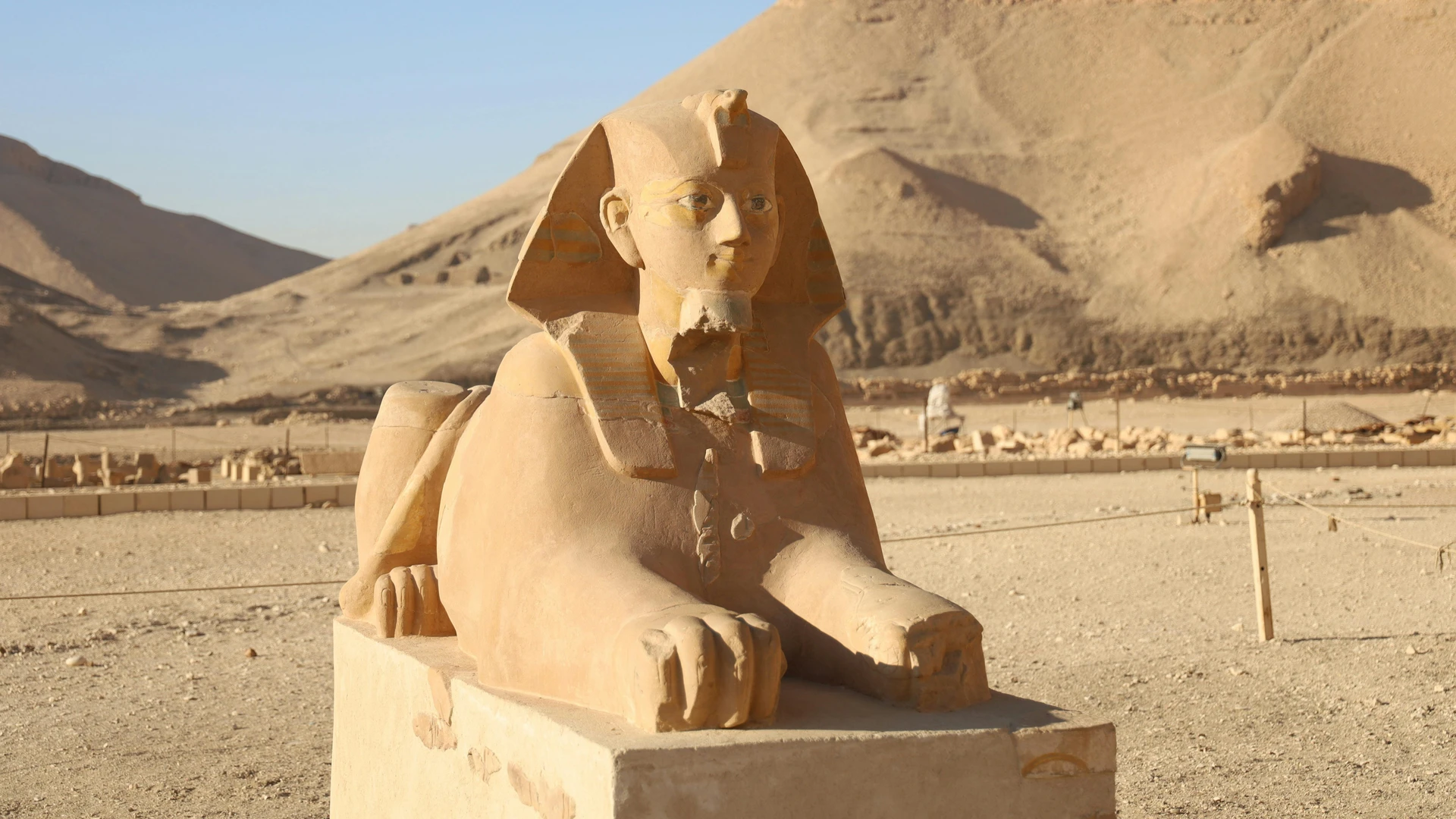Luxor, Egypt - Limestone sphinx statue in the temple of hatshepsut, showcasing ancient egyptian art and architecture.