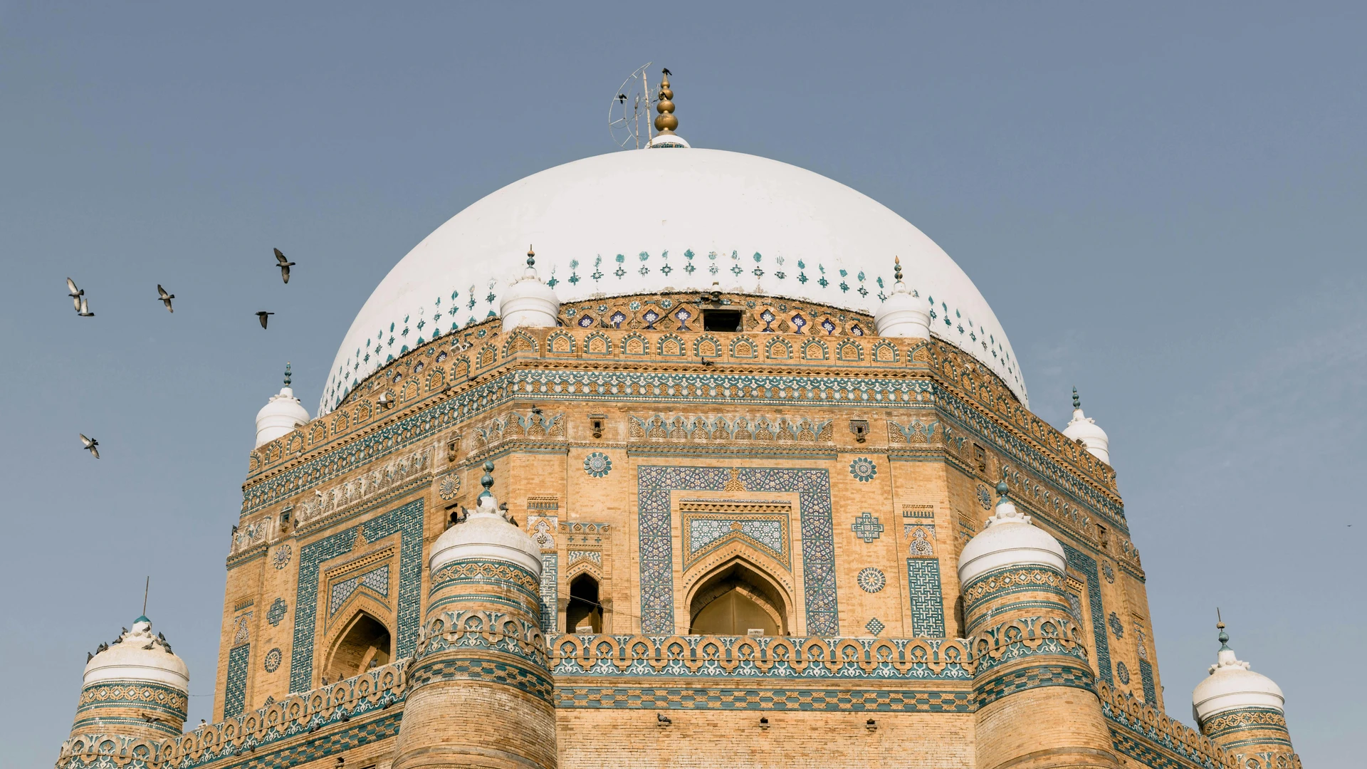 Marsa Alam, Egypt - Stunning architectural details of the tomb of shah rukn-e-alam in multan, pakistan under a blue sky.