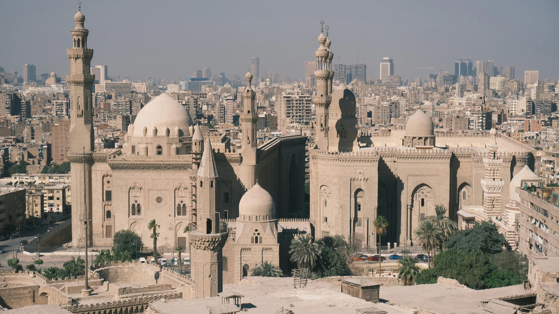 Cairo, Egypt - Scenic aerial view of cairo with the iconic mosque-madrassa of sultan hassan and city skyline.