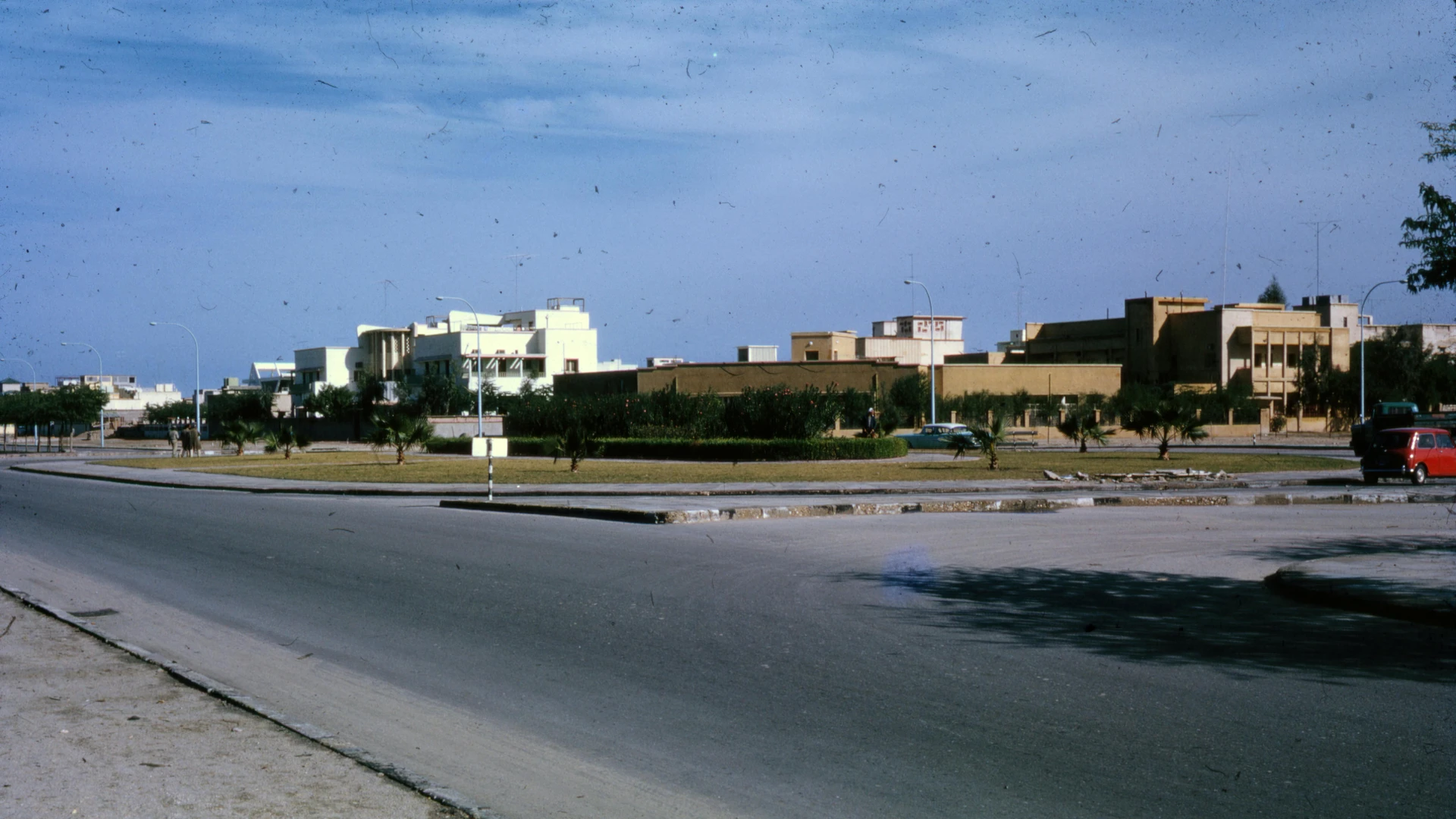 Hurghada, Egypt - Nostalgic view of a middle eastern street with vintage architecture and clear blue skies.